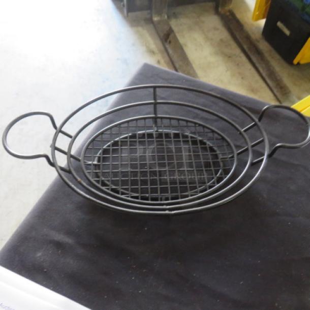 11x9 black metal fast food basket with grid base and side handles. Good condition, durable for serving or display.