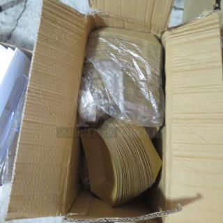 Open cardboard box containing a lot of brown paper boats, neatly stacked and partially wrapped in plastic.