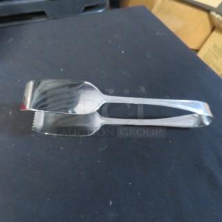 Stainless steel buffet tong, 4XBID, polished finish, serrated and smooth edges, excellent condition.