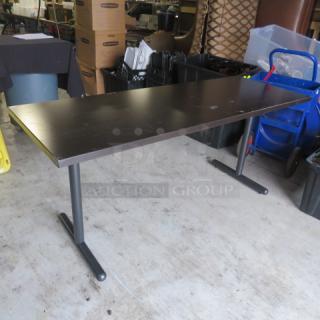 Kimball folding table, 66x24x29 inches, brown top, sturdy metal legs, used condition, ideal for office or events.