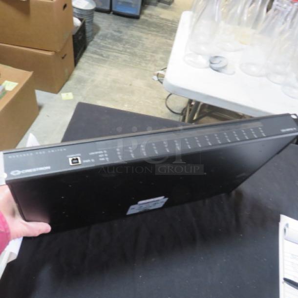 Crestron 16-Port Ethernet Switch, model CEN-SWPOE-16. Black, slim design. Power over Ethernet. Price: $2870.01.