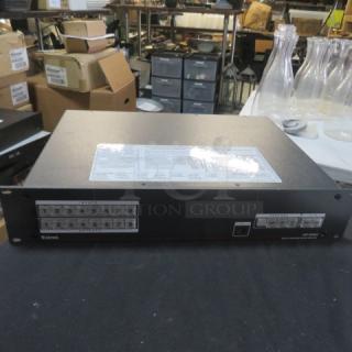 Extron DXP Series Digital Crosspoint Matrix Switcher, black, visible control panel, good condition.