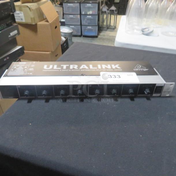 Behringer Ultralink DS2800, 2 Input/8 Output Splitter, rack-mountable, with control knobs, in used condition.
