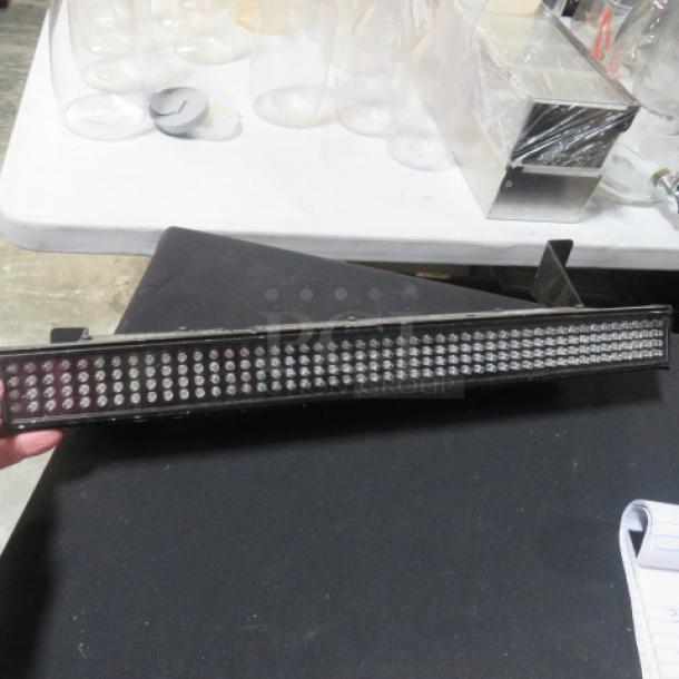 Chauvet Colorstrip Mini LED light bar with brackets, excellent condition, used, shown on table.