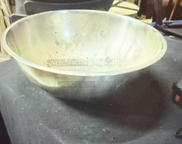 16-inch stainless steel mixing bowl, lightly used, with a visible "Auction" marking on the side.