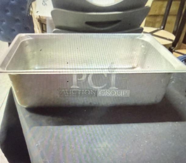 Full-size 6-inch deep hotel pan, stainless steel, good condition, marked with "PCT Auction Group" logo.