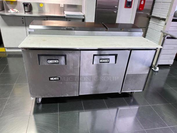 True TPP-67 commercial prep table, stainless steel, labels for cheeses, meats, veggies, tested, working condition.