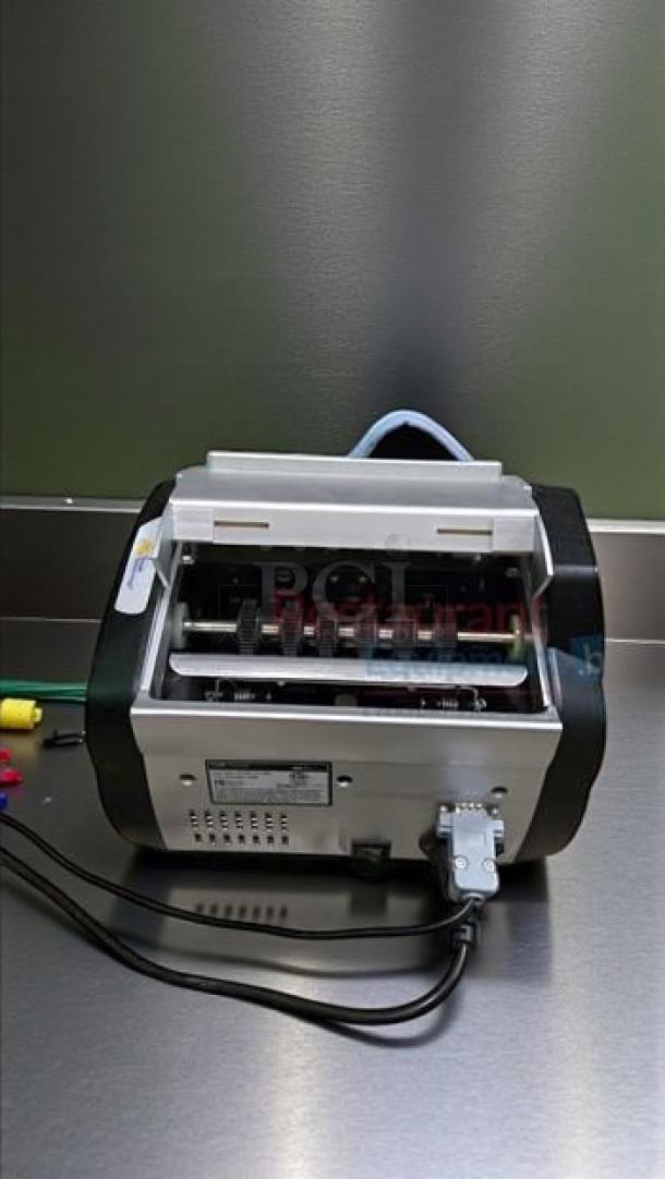 Royal Sovereign RBC-2100 high-speed bill counting machine, superior condition, with counterfeit detection, and external display.