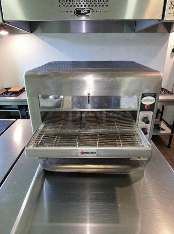 Omcan TS-7000 conveyor toaster oven, commercial-grade, stainless steel, superior condition, 208V, UL Listed, fully tested.
