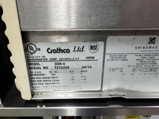 Crathco D35-4 triple bowl refrigerated beverage dispenser, 115V, NSF & UL listed, serial T272253, excellent condition.