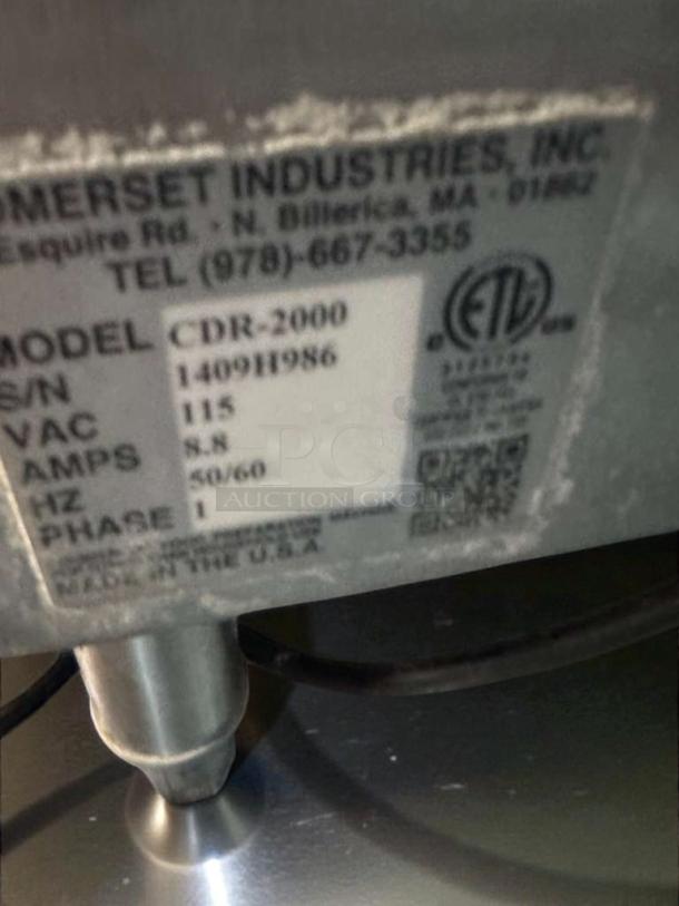 Alt text: Somerset CDR-2000 dough roller, ETL & NSF listed, 115V, fully operational, outstanding condition, label with specs shown.