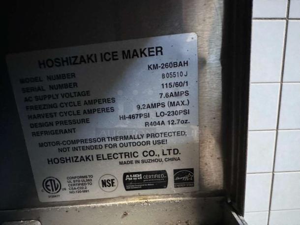 Hoshizaki KM-260BAH commercial ice maker label showing model details, UL and NSF certifications, and electrical specifications.