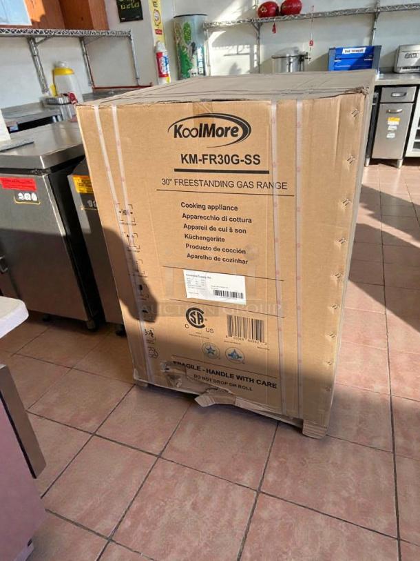 KoolMore KM-FR30G-SS 30" freestanding gas range in like-new condition, packaged in box, with minor scratches and dents.