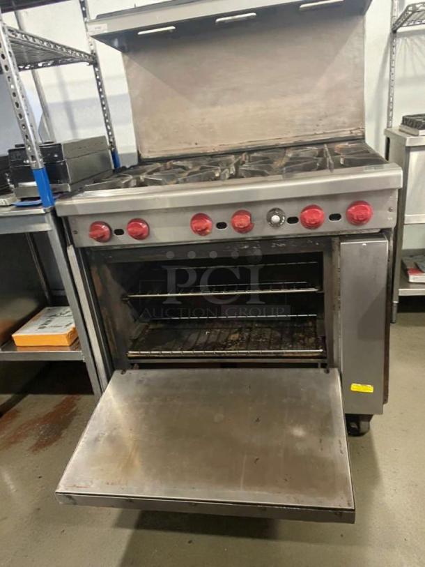 American Range Commercial Gas Range with 6 burners and oven, premium condition, fully tested and working.