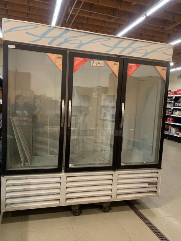 Beverage-Air CRG74-1 commercial merchandiser fridge with 3 glass doors; superior condition; 115V, single phase, fully tested.