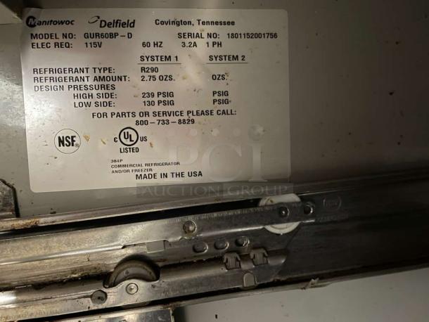 Label for Delfield GUR60BP-D undercounter refrigerator. Shows model, voltage, refrigerant type, design pressure, NSF, UL listed.