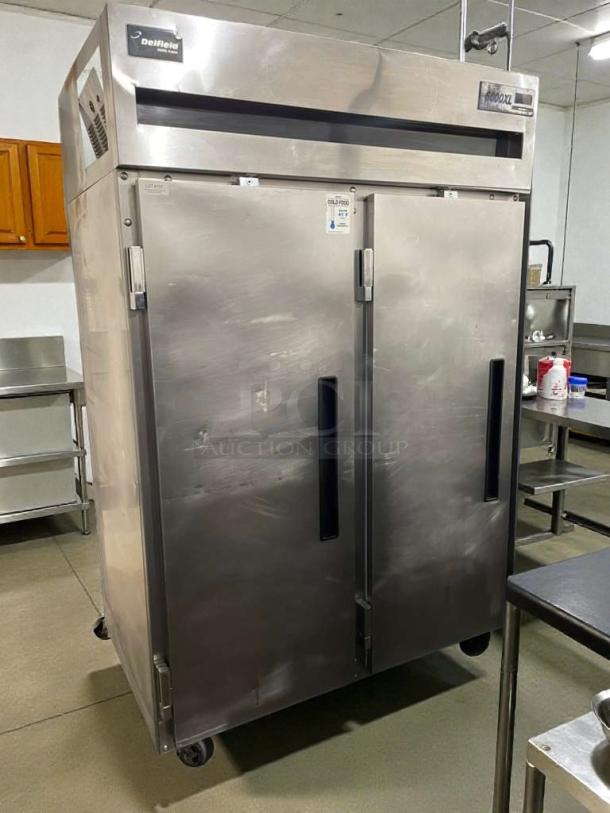Delfield 6151XL-S15 commercial reach-in refrigerator, stainless steel, dual-door, 115V, fully tested, in refined condition.