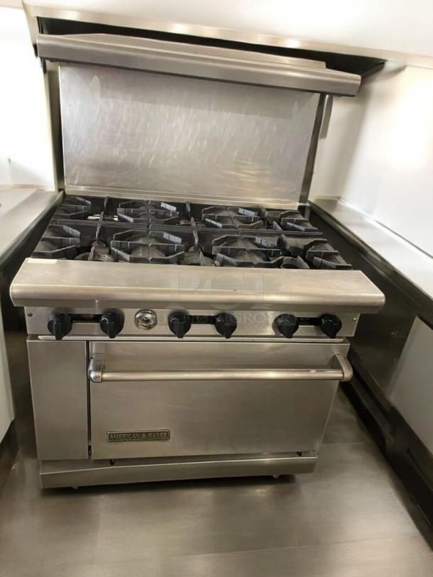 American Range Commercial 6-Burner Gas Range with oven, stainless steel, excellent condition, fully tested. Model from California, USA.