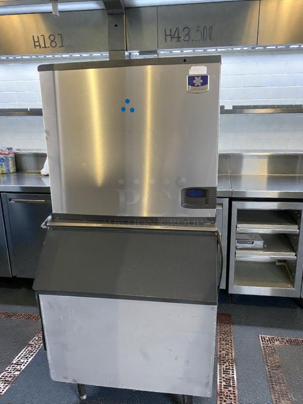 Manitowoc IY0906A-261 commercial ice maker in exceptional condition, stainless steel finish, fully tested, 208-230V, single phase.