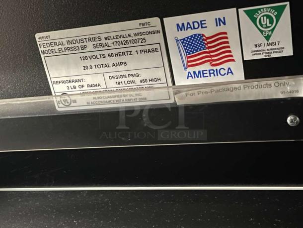 Federal Industries Refrigerated Merchandiser, Model ELPRSS3 BP, tags showing 120V, 60Hz, 1 Phase, made in USA.