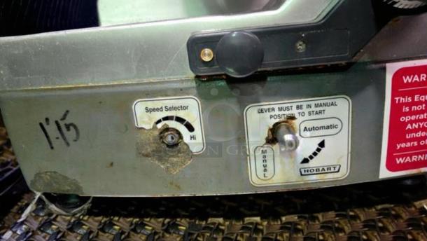 Hobart 2912 commercial meat slicer control panel, showing speed selector and manual/automatic settings. Fully tested.