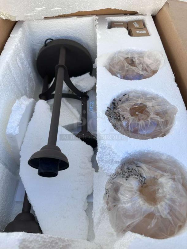 Brand new Zuomor Jump Table Lamp Set, 3-light rustic amber glass, in original packaging with styrofoam inserts, premium condition.