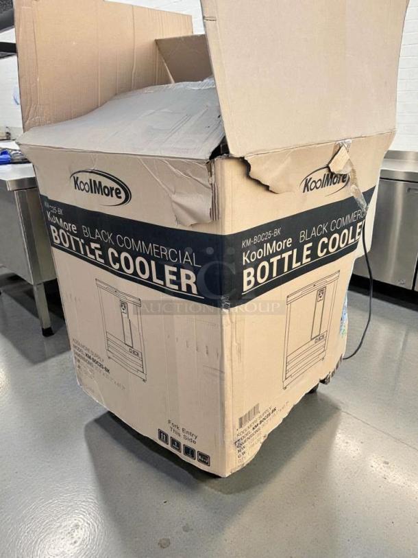 Brand new KoolMore KM-BC25-BK black commercial bottle cooler, underbar beverage refrigerator in original box, UL & NSF listed.