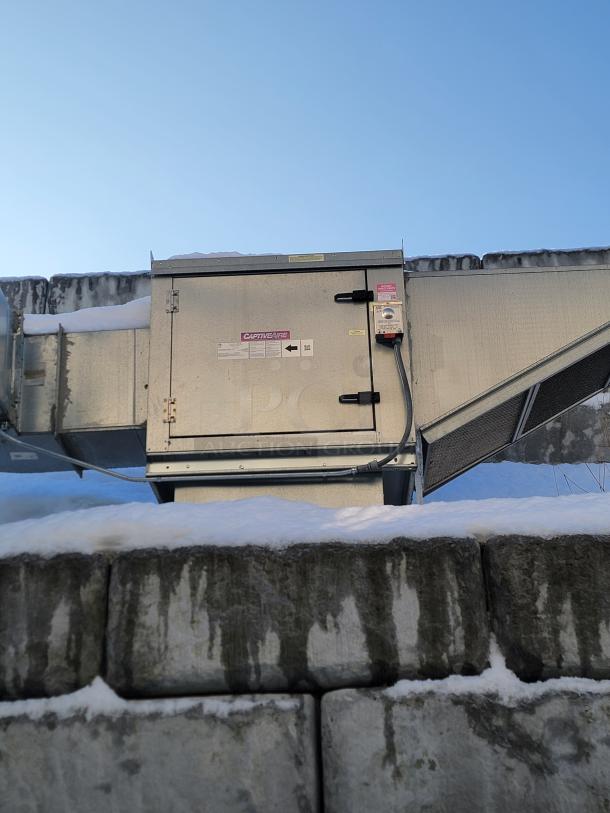 Econ-Air 16FT commercial kitchen exhaust hood system, model 5424-EX2. Features heavy-duty construction and efficient smoke extraction.