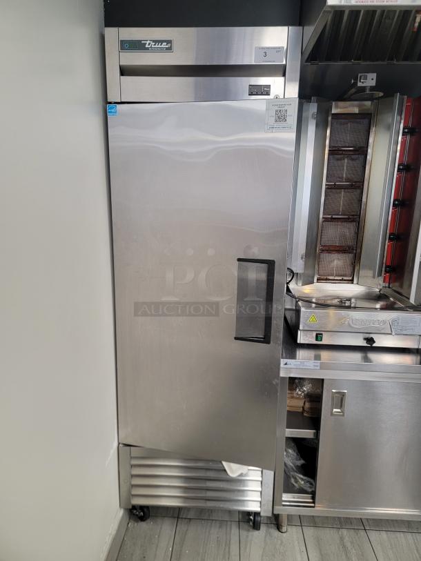 True T-23-HC commercial refrigerator, pristine stainless steel, digital display, castors, single-door, eco-friendly refrigerant.