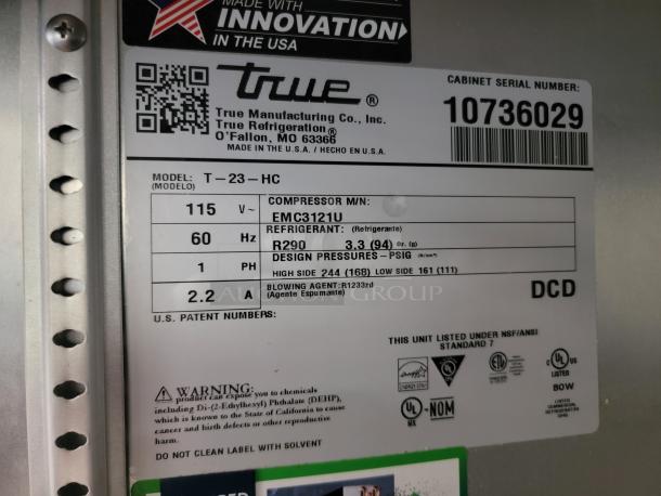 True T-23-HC reach-in refrigerator label showing model, power details, R290 refrigerant, and NSF compliance.