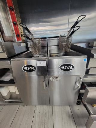 Pair of Royal REEF-35 deep fryers, stainless steel, 24,000 BTU/hr, natural gas, with baskets, clean, professional-grade.