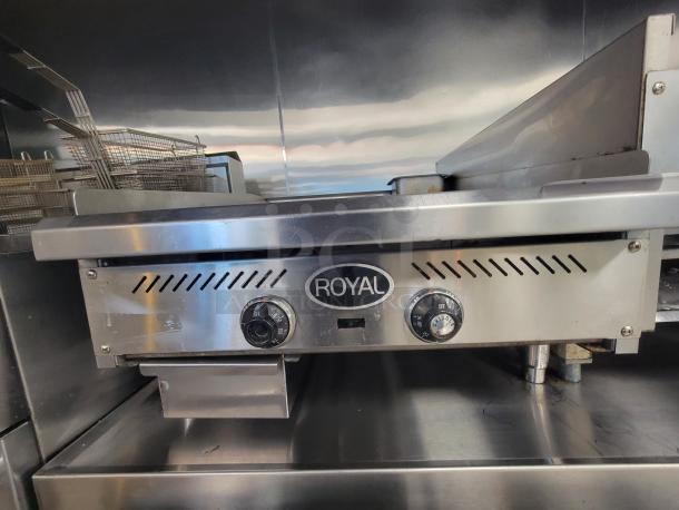 Royal 24" Commercial Gas Griddle, Model RMG-24, excellent condition, polished steel plate, two manual controls.