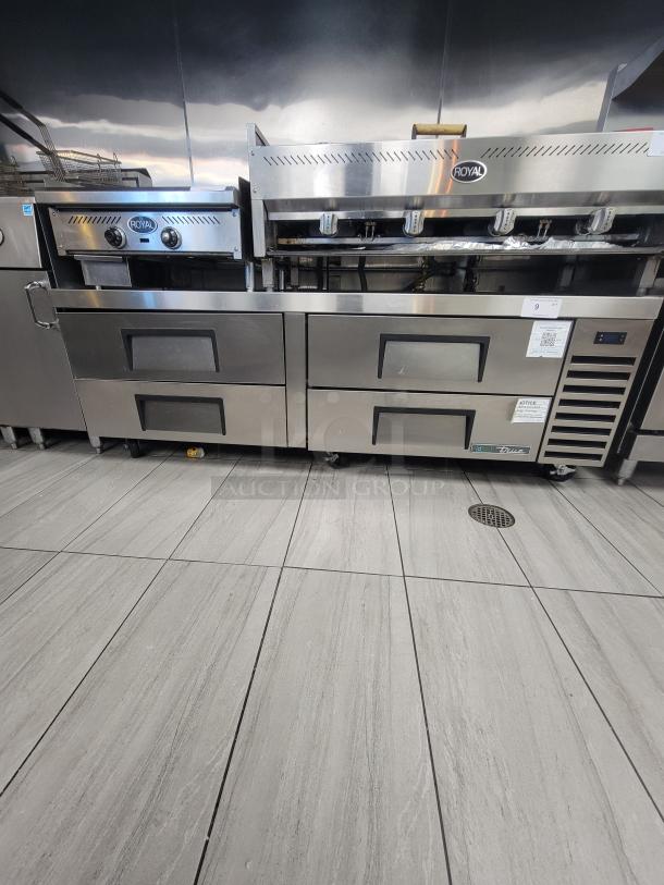 True TRCB-72-HC refrigerated chef base, 72", like new, with stainless steel top, four drawers, and casters for mobility.