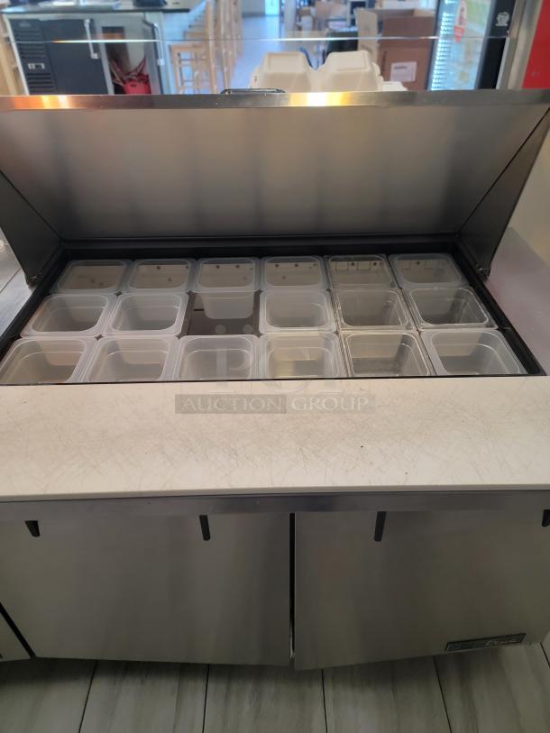 True TSSU-48-18M-B-HC sandwich prep table, 18-pan capacity, stainless steel, refrigerated storage, heavy-duty casters.