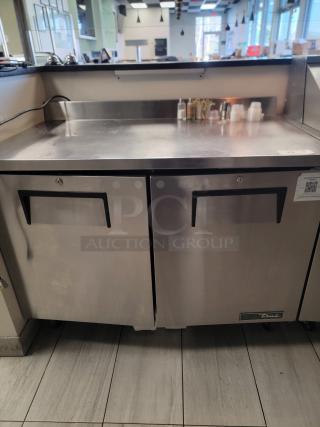 True TWT-48-HC commercial worktop refrigerator; stainless steel, two sections, eco-friendly R290, heavy-duty casters, like new.