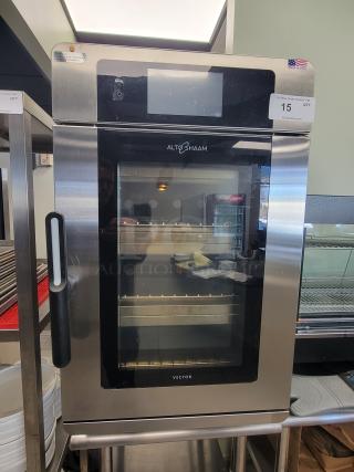 Alto-Shaam Vector VMC-H3H multi-cook oven with three chambers, touchscreen, on 3' stainless steel stand. Excellent condition.