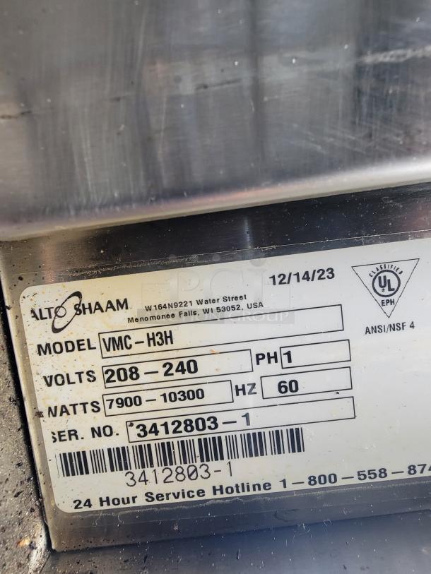 Alto-Shaam Vector VMC-H3H multi-cook oven label showing model, volts, watts, and service hotline info.