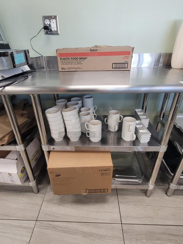 Commercial 3' Prep Station, KCS WT-2436 stainless steel work table with Sysco food wrap, Earth Plus bags, ceramic mugs, ramekins.