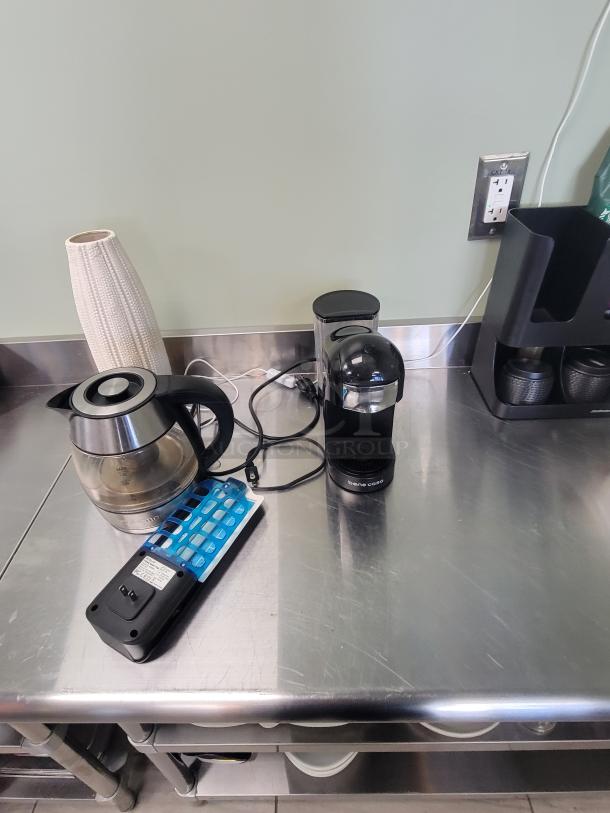 5-foot stainless steel coffee station with Bene Casa espresso maker, electric kettle, and storage. Includes power strip.