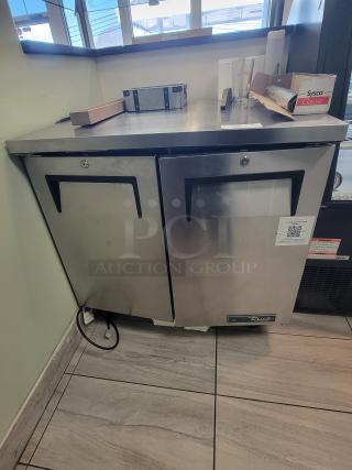 True TUC-36-HC undercounter refrigerator, stainless steel, new condition, eco-friendly R290 refrigerant, on casters.