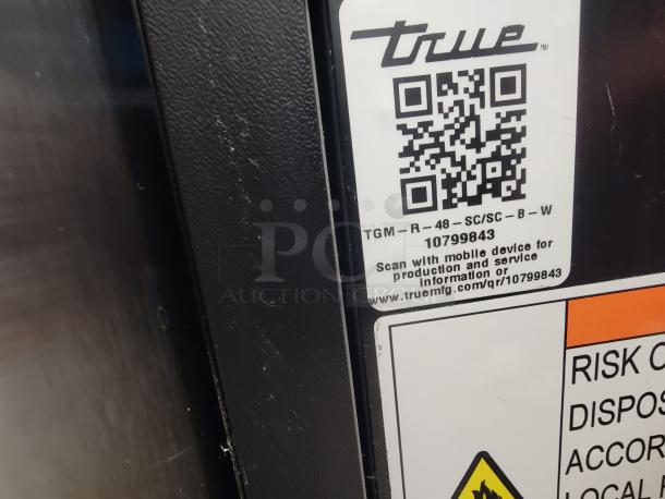 True refrigerated display case model TGM-R-48-SC/SC-B-W label, featuring QR code for service info.