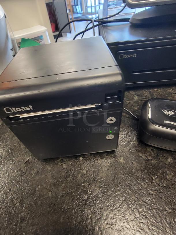 Toast POS system bundle featuring terminal and printer, in great condition, for restaurants or retail.