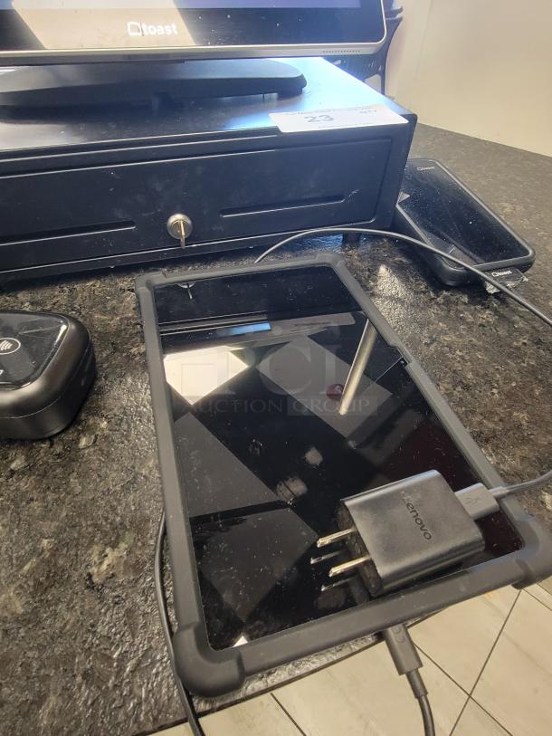 Toast POS system bundle featuring a monitor, cash drawer, card reader, and tablet with Lenovo charger, in great condition.