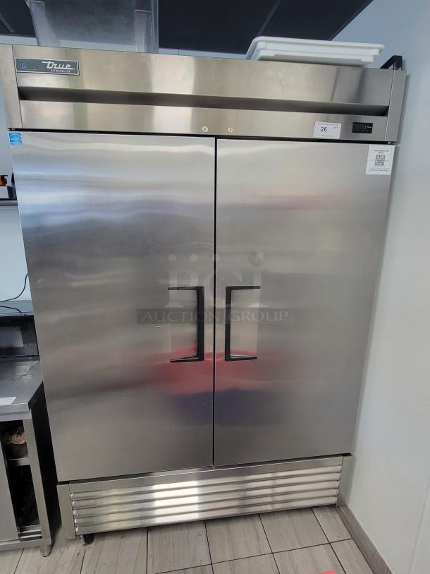 True T-49-HC double door refrigerator, stainless steel, pristine condition, energy-efficient, ideal for commercial use.