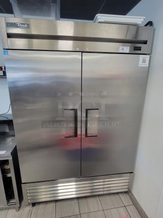 True T-49-HC double door refrigerator, stainless steel, pristine condition, energy-efficient, ideal for commercial use.