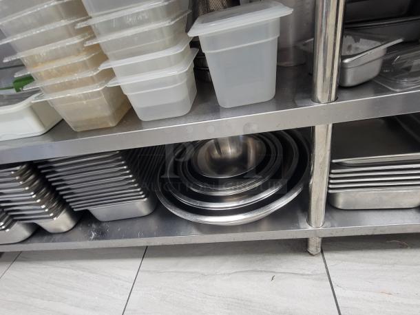 9' Sapphire Professional Series 108 stainless workstation with built-in drawers, double-decker undershelf, kitchen kit included.