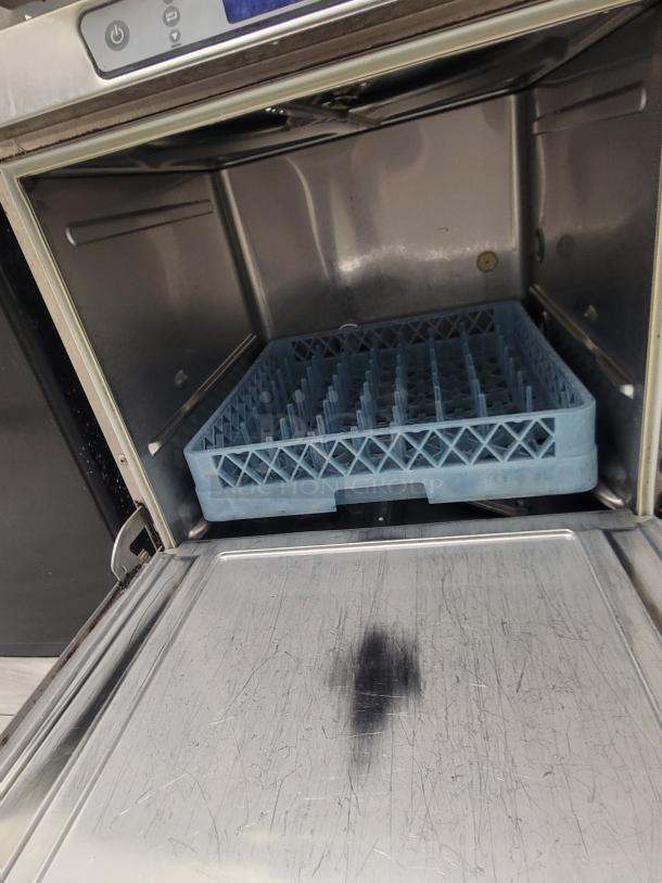 Hobart LXe commercial undercounter dishwasher, hot water sanitizing, interior view with rack, lightly scratched interior.