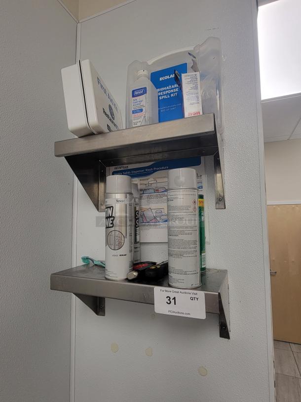 Keystone stainless steel wall shelves with first aid kit, spill kit, isopropyl alcohol, and cleaning supplies. Durable and ready to mount.
