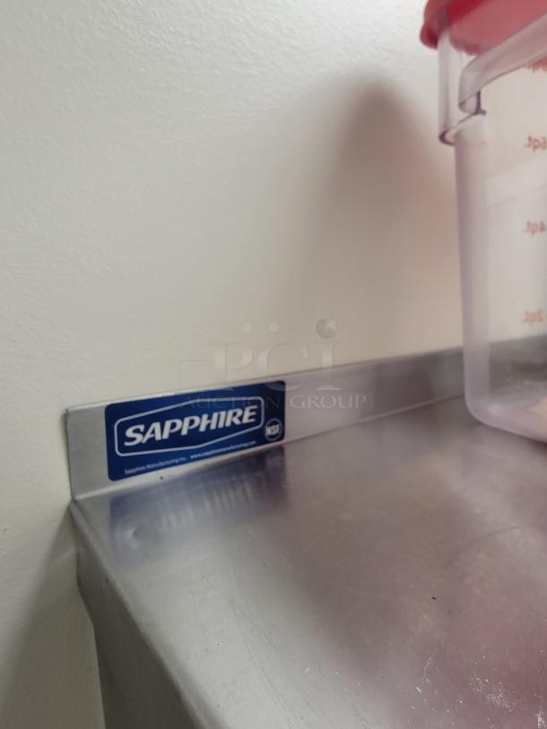 Heavy duty Sapphire SSWMS stainless steel wall shelf, NSF-certified, 9-foot, includes storage bins and containers, great condition.