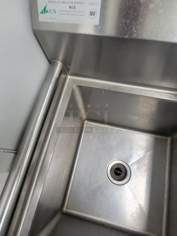 Stainless steel sink with NSF label by KCS, part of commercial kitchen dish station bundle, professional-grade condition.